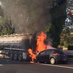 L'incendio scoppiato dopo l'incidente tra un'automobile e un autoarticolato sulla A14